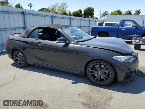2015 BMW 2 Series M235i with VIN WBA1M1C55FV393315, listed as a Copart auction lot 58587055 with 80,998 mi miles and Salvage title. Bid and sale history available at DreamBid. Image 4.