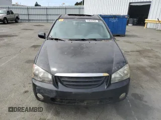 2005 Kia Spectra with VIN KNAFE162655074198, listed as a Copart auction lot 71015104 with 200,819 mi miles and Salvage Title. Bid and sale history available at DreamBid. Image 5.