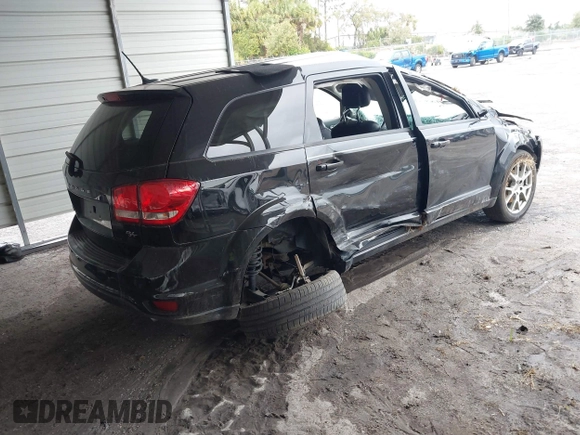 2015 Dodge Journey R/T with VIN 3C4PDDEG3FT555035, listed as a IAAI auction lot 41067936 with 214,244 mi miles and . Bid and sale history available at DreamBid. Image 4.
