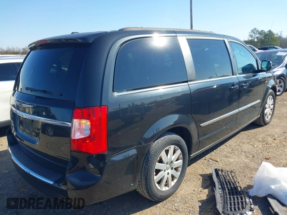 2015 Chrysler Town & Country Touring with VIN 2C4RC1BG9FR626501, listed as a IAAI auction lot 41279210 with 211,206 mi miles and . Bid and sale history available at DreamBid. Image 4.