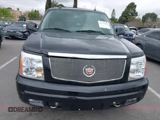 2005 Cadillac Escalade z VIN 1GYEC63T95R181022, wystawiony jako IAAI lot #41777173 z przebiegiem 44 348 mil mil oraz . Historia ofert i sprzedaży dostępna na DreamBid. Obrazek 11.