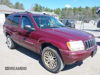 2003 Jeep Grand Cherokee Limited z VIN 1J4GW58S23C577383, wystawiony jako IAAI lot #41957536 z przebiegiem 187 755 mil mil oraz . Historia ofert i sprzedaży dostępna na DreamBid. Obrazek 1.