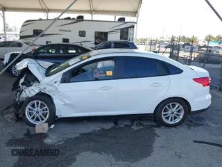 2017 Ford Focus SE with VIN 1FADP3F2XHL300331, listed as a IAAI auction lot 41975453 with Not provided miles and . Bid and sale history available at DreamBid. Image 13.