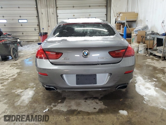 2014 BMW 6 Series 650i xDrive z VIN WBA6B4C59ED099398, wystawiony jako Copart lot #42305515 z przebiegiem 111 156 mil mil oraz Czysty tytuł • Clean title. Historia ofert i sprzedaży dostępna na DreamBid. Obrazek 6.