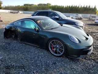 2022 Porsche 911 GT3 with VIN WP0AC2A9XNS270305, listed as a Copart auction lot 57119824 with 4,926 mi miles and Salvage Title. Bid and sale history available at carsss.com. Image 4.