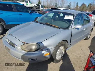1996 Mercury Sable GS with VIN 1MELM50U5TG605997, listed as a IAAI auction lot 41751266 with 179,662 mi miles. Bid and sale history available at carsss.com. Image 2.
