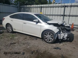 2014 Toyota Avalon Limited with VIN 4T1BK1EB2EU097877, listed as a Copart auction lot 54678115 with 112,634 mi miles and Clean Title. Bid and sale history available at carsss.com. Image 4.