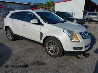 2015 Cadillac SRX Premium Collection with VIN 3GYFNDE32FS530357, listed as a IAAI auction lot 41976585 with 92,335 mi miles and . Bid and sale history available at carsss.com. Image 1.