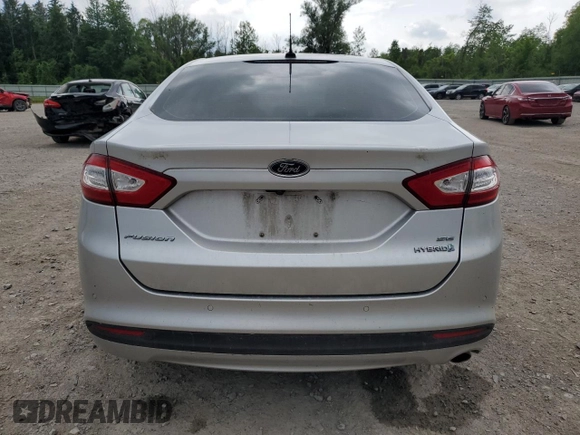 2016 Ford Fusion SE Hybrid with VIN 3FA6P0LU1GR366778, listed as a Copart auction lot 61280135 with 89,585 mi miles and Salvage title. Bid and sale history available at DreamBid. Image 6.