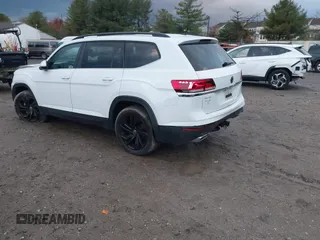 2022 Volkswagen Atlas SE z VIN 1V2KR2CA1NC555087, wystawiony jako IAAI lot #40921013 z przebiegiem 62 834 mil mil oraz . Historia ofert i sprzedaży dostępna na DreamBid. Obrazek 3.