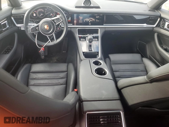 2018 Porsche Panamera 4 E-Hybrid z VIN WP0AE2A79JL129223, wystawiony jako Copart lot #79005304 z przebiegiem 22 877 mil mil oraz Szkoda całkowita • Salvage title. Historia ofert i sprzedaży dostępna na DreamBid. Obrazek 8.