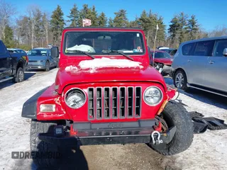 2005 Jeep Wrangler Unlimited with VIN 1J4FA44S05P375941, listed as a IAAI auction lot 41420299 with 138,859 mi miles. Bid and sale history available at carsss.com. Image 12.