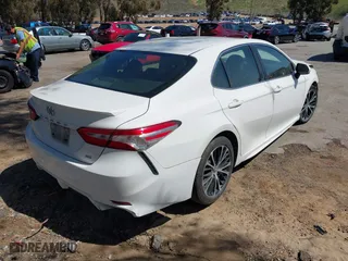 2018 Toyota Camry LE with VIN JTNB11HK2J3000269, listed as a IAAI auction lot 41812634 with 248,881 mi miles. Bid and sale history available at carsss.com. Image 4.