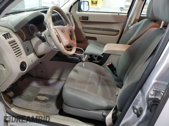2010 Ford Escape XLS with VIN 1FMCU9C78AKA44179, listed as a Copart auction lot 80518154 with 175,149 mi miles and Salvage title. Bid and sale history available at DreamBid. Image 7.