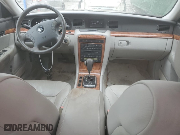 2004 Kia Amanti z VIN KNALD124645042962, wystawiony jako Copart lot #78897374 z przebiegiem 182 054 mil mil oraz Tytuł czysty. Historia ofert i sprzedaży dostępna na DreamBid. Obrazek 8.