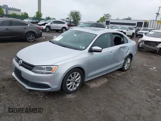 2013 Volkswagen Jetta SE with VIN 3VWDP7AJ0DM363220, listed as a IAAI auction lot 42245043 with 165,498 mi miles and . Bid and sale history available at DreamBid. Image 2.