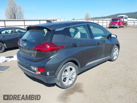 2017 Chevrolet Bolt EV LT z VIN 1G1FW6S00H4188556, wystawiony jako IAAI lot #42025003 z przebiegiem 24 009 mil mil oraz . Historia ofert i sprzedaży dostępna na DreamBid. Obrazek 4.
