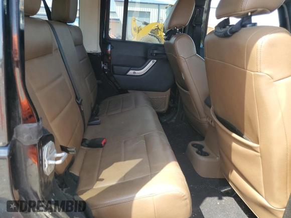 2012 Jeep Wrangler Unlimited Sahara with VIN 1C4HJWEG5CL205826, listed as a Copart auction lot 58222115 with 98,940 mi miles and Salvage title. Bid and sale history available at DreamBid. Image 11.