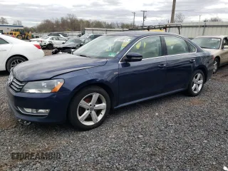 2015 Volkswagen Passat S with VIN 1VWAT7A30FC107907, listed as a Copart auction lot 53165615 with 196,059 mi miles and Clean title. Bid and sale history available at DreamBid. Image 1.