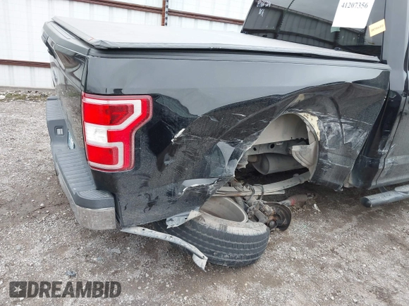 2018 Ford F-150 XL with VIN 1FTEW1EB0JKD85702, listed as a IAAI auction lot 41207356 with 136,528 mi miles. Bid and sale history available at carsss.com. Image 6.