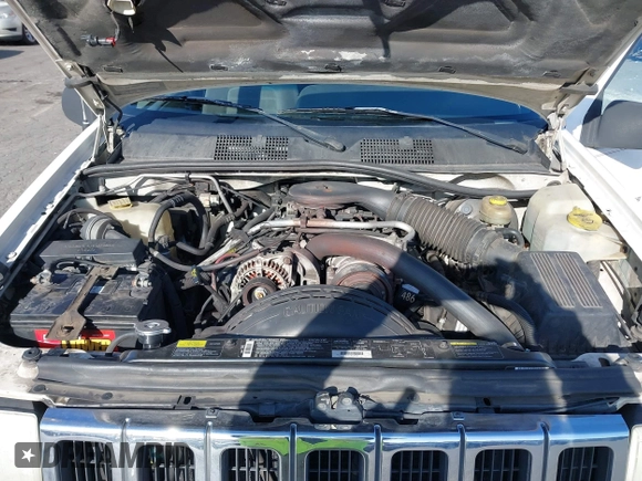 1996 Jeep Grand Cherokee Laredo z VIN 1J4GZ58Y5TC186403, wystawiony jako IAAI lot #41562270 z przebiegiem 205 797 mil mil oraz . Historia ofert i sprzedaży dostępna na DreamBid. Obrazek 10.