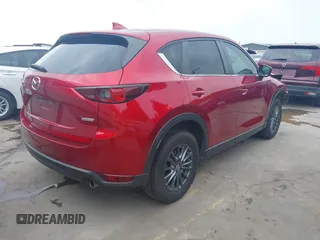 2019 Mazda CX-5 Touring with VIN JM3KFACM7K0696815, listed as a IAAI auction lot 41921763 with 46,900 mi miles. Bid and sale history available at carsss.com. Image 4.