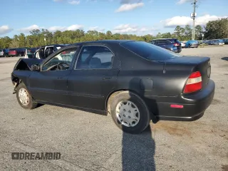 1995 Honda Accord LX with VIN 1HGCD5636SA161516, listed as a Copart auction lot 80268014 with 201,402 mi miles and Salvage Title. Bid and sale history available at carsss.com. Image 2.
