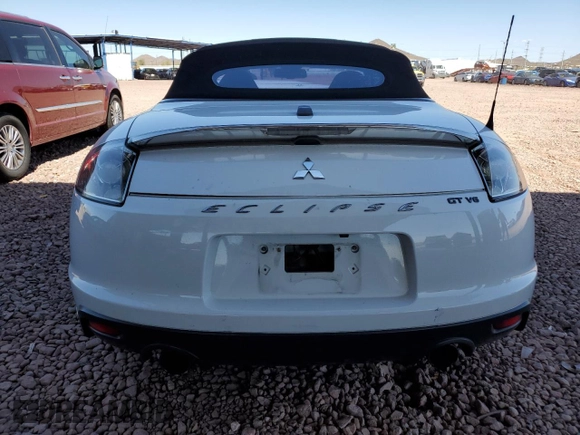 2012 Mitsubishi Eclipse GT with VIN 4A37L3ET5CE002857, listed as a Copart auction lot 48827535 with 97,772 mi miles and Salvage Title. Bid and sale history available at carsss.com. Image 6.