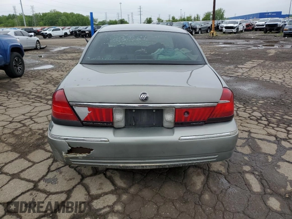 2000 Mercury Grand Marquis LS z VIN 2MEFM75WXYX742065, wystawiony jako Copart lot #57655795 z przebiegiem 175 070 mil mil oraz Tytuł czysty. Historia ofert i sprzedaży dostępna na DreamBid. Obrazek 6.