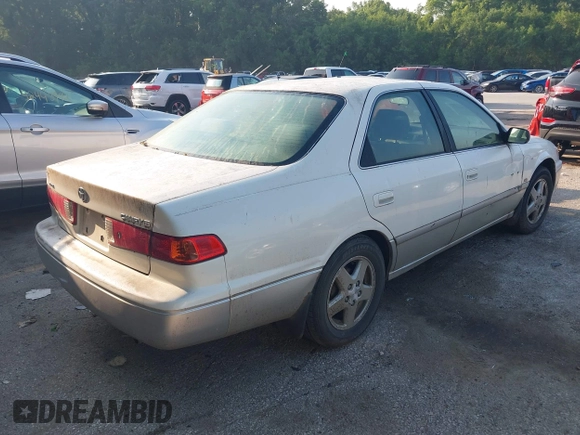 2001 Toyota Camry CE with VIN JT2BG22K010570556, listed as a IAAI auction lot 42458031 with 357,046 mi miles and . Bid and sale history available at DreamBid. Image 4.