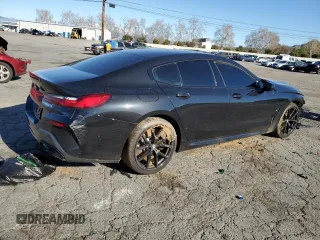 2023 BMW 8 Series M850i with VIN WBAGV8C06PCL57473, listed as a Copart auction lot 39398193 with 0 mi miles. Bid and sale history available at carsss.com. Image 3.