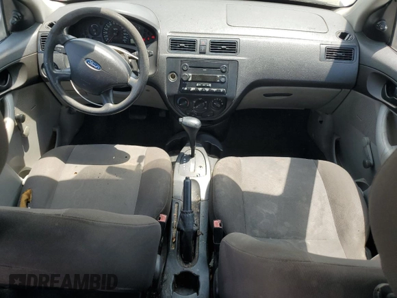 2007 Ford Focus S z VIN 1FAFP34NX7W106482, wystawiony jako Copart lot #57675245 z przebiegiem 170 237 mil mil oraz Szkoda całkowita • Salvage title. Historia ofert i sprzedaży dostępna na DreamBid. Obrazek 8.