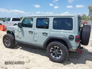 2024 Jeep Wrangler Rubicon with VIN 1C4PJXFG3RW295565, listed as a IAAI auction lot 42026211 with 5,661 mi miles. Bid and sale history available at carsss.com. Image 15.
