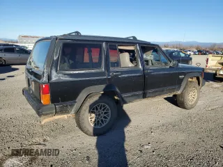 1996 Jeep Cherokee Sport with VIN 1J4FJ68SXTL274898, listed as a Copart auction lot 87676505 with 258,358 mi miles and Salvage Title. Bid and sale history available at carsss.com. Image 3.
