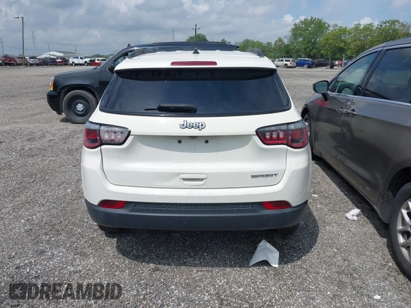 2018 Jeep Compass Sport with VIN 3C4NJCAB0JT124679, listed as a IAAI auction lot 42720262 with 119,267 mi miles and . Bid and sale history available at DreamBid. Image 16.
