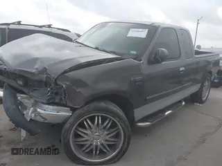 2003 Ford F-150 XL with VIN 1FTRX17W93NB63496, listed as a IAAI auction lot 42406687 with Not provided miles and . Bid and sale history available at DreamBid. Image 2.
