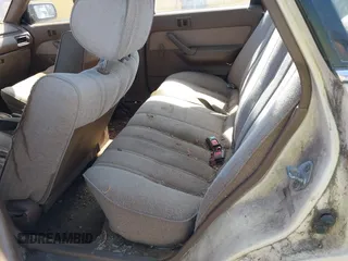1987 Toyota Camry z VIN JT2SV21EXH3130273, wystawiony jako IAAI lot #42472806 z przebiegiem 124 958 mil mil oraz . Historia ofert i sprzedaży dostępna na DreamBid. Obrazek 8.