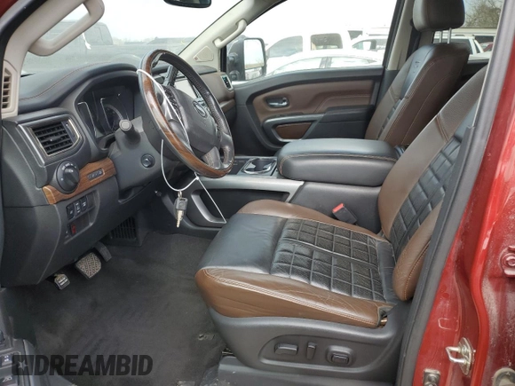 2016 Nissan Titan Platinum Reserve with VIN 1N6BA1F40GN515712, listed as a Copart auction lot 56931745 with 71,096 mi miles and Non repairable. Bid and sale history available at DreamBid. Image 7.