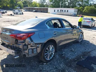 2024 Infiniti Q50 Luxe with VIN JN1EV7BP9RM601099, listed as a IAAI auction lot 42331819 with 8,711 mi miles and . Bid and sale history available at DreamBid. Image 4.