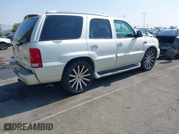 2004 Cadillac Escalade with VIN 1GYEC63T74R310907, listed as a IAAI auction lot 42747095 with 165,755 mi miles and . Bid and sale history available at DreamBid. Image 4.