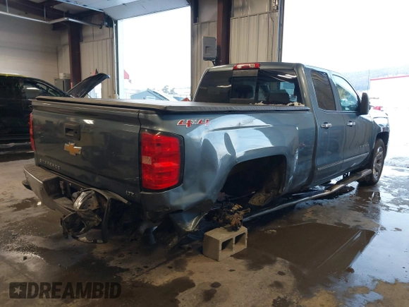 2014 Chevrolet Silverado 1500 LTZ with VIN 1GCVKSEJ2EZ312286, listed as a IAAI auction lot 41496345 with 76,747 mi miles and . Bid and sale history available at DreamBid. Image 4.