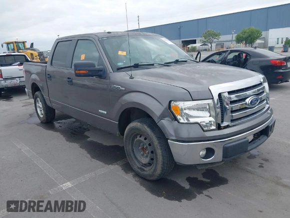 2011 Ford F-150 XLT with VIN 1FTFW1CT8BKD21411, listed as a IAAI auction lot 42077959 with 152,665 mi miles. Bid and sale history available at carsss.com. Image 1.