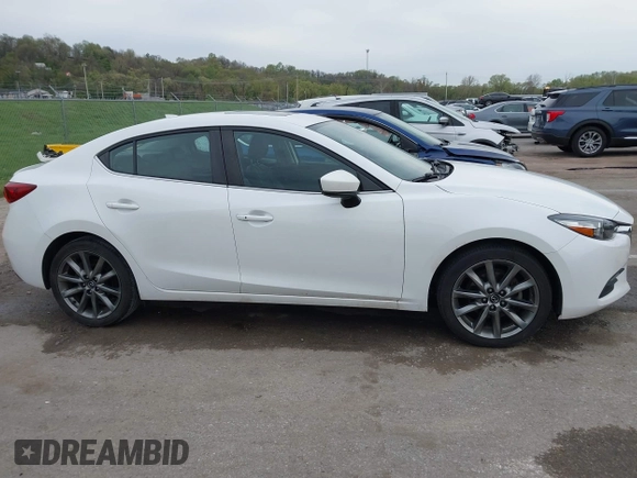 2018 Mazda 3 Touring with VIN 3MZBN1V32JM190611, listed as a IAAI auction lot 42032844 with 63,493 mi miles and . Bid and sale history available at DreamBid. Image 14.