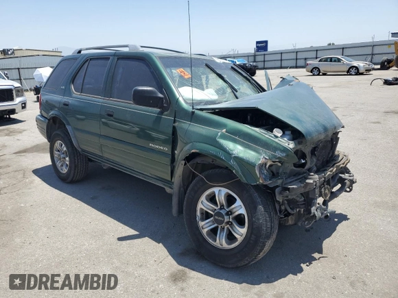 2000 Isuzu Rodeo S with VIN 4S2CK58W2Y4324928, listed as a Copart auction lot 59800375 with Not provided miles and Salvage title. Bid and sale history available at DreamBid. Image 4.