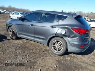 2017 Hyundai Santa Fe 2.4L with VIN 5XYZTDLB0HG453575, listed as a IAAI auction lot 41036334 with 114,031 mi miles and . Bid and sale history available at DreamBid. Image 3.