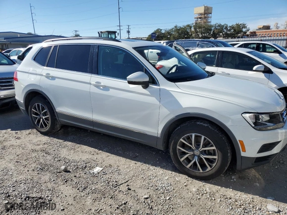 2020 Volkswagen Tiguan SE with VIN 3VV3B7AX4LM138493, listed as a Copart auction lot 89118915 with 133,354 mi miles and Salvage Title. Bid and sale history available at carsss.com. Image 4.
