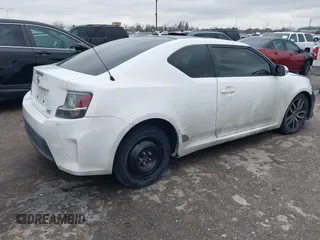 2014 Scion tC with VIN JTKJF5C73E3074035, listed as a IAAI auction lot 41426238 with 116,469 mi miles. Bid and sale history available at carsss.com. Image 4.