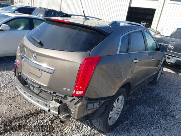 2014 Cadillac SRX Luxury Collection with VIN 3GYFNBE35ES658546, listed as a IAAI auction lot 41690861 with 66,263 mi miles. Bid and sale history available at carsss.com. Image 4.