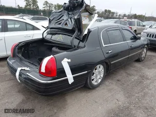 2011 Lincoln Town Car Executive L w/Livery Pkg with VIN 2LNBL8EV2BX756979, listed as a IAAI auction lot 41927794 with NaN miles. Bid and sale history available at carsss.com. Image 4.