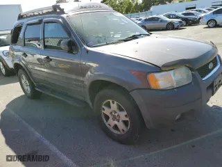 2002 Ford Escape Limited with VIN 1FMCU04122KD65674, listed as a Copart auction lot 56336504 with 199,739 mi miles and Salvage Title. Bid and sale history available at carsss.com. Image 4.
